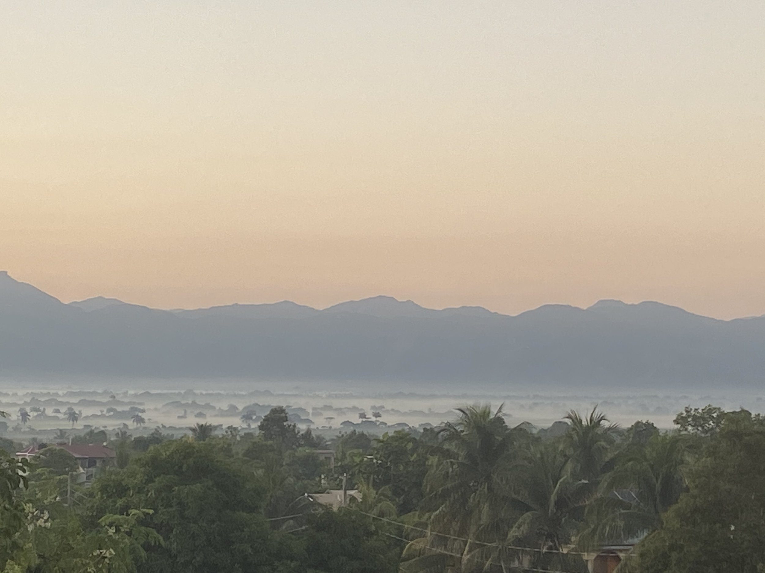 Misty mountains at dawn over Cap-Haïtien, Haiti